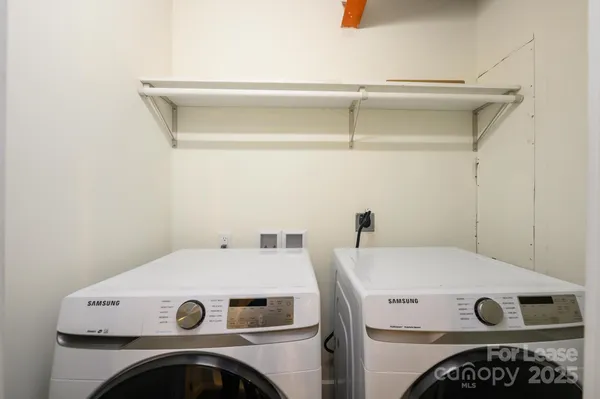 a bathroom with a shower and a toilet
