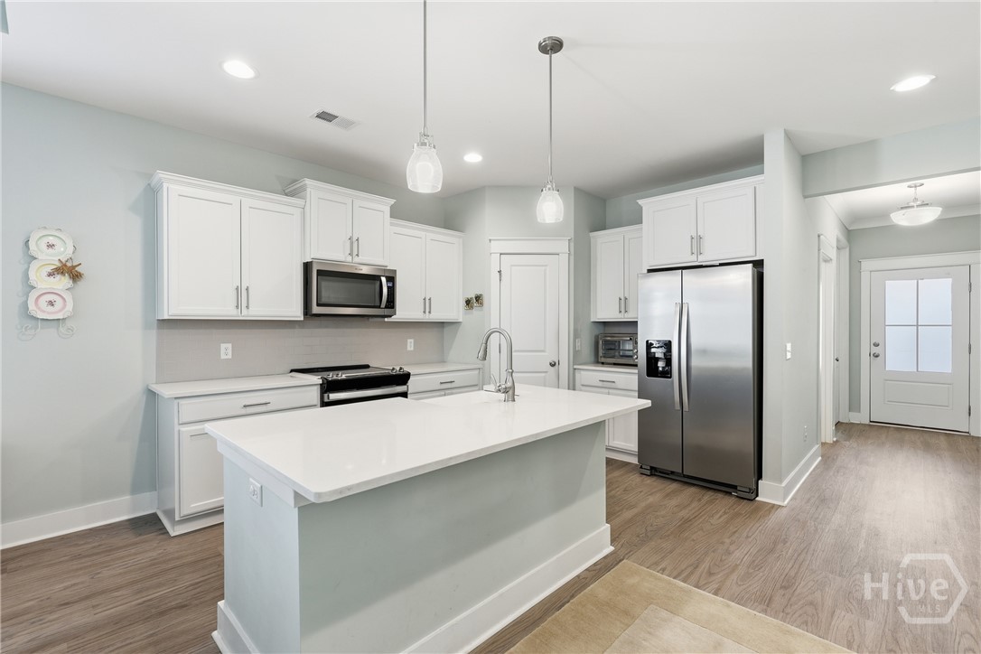 141 Mallory Place Pooler, GA 31322 - Photo 1 of 49 Kitchen with Quartz countertops and island