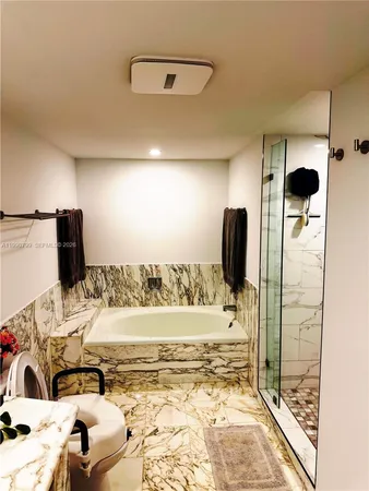 a bedroom with a bed and a mirror