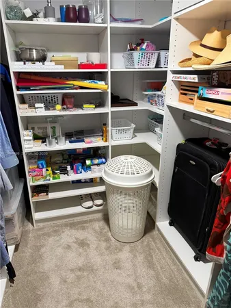 a room with storage and utility