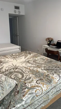 a view of a livingroom with wooden floor