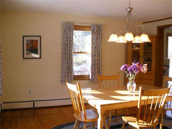 43 Gulf Road Pelham, MA 01002 - Photo 8 of 26 a view of a dining room with furniture and chandelier