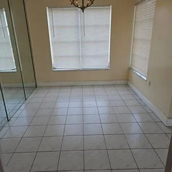 a view of a livingroom and window