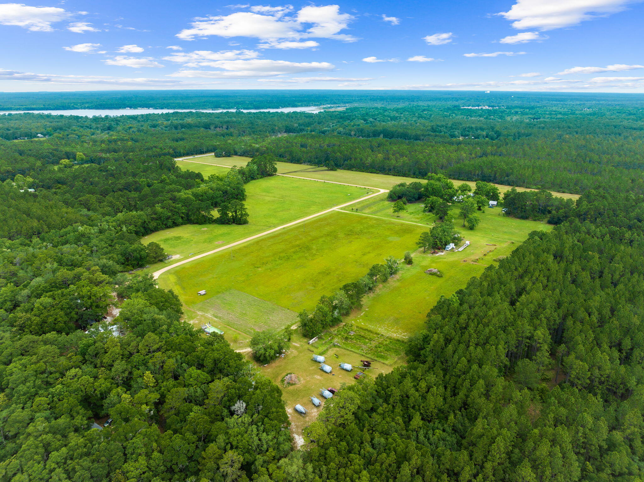 2671 County Highway 83A West Freeport, FL 32439 - Photo 14 of 55 a view of a golf course with a lake
