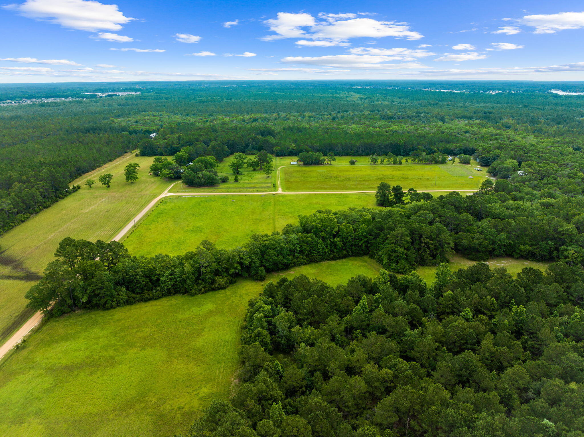 2671 County Highway 83A West Freeport, FL 32439 - Photo 17 of 55 a view of a big yard with swimming pool and green space