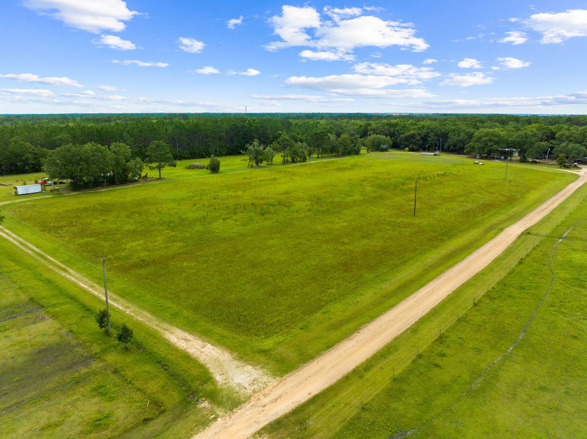 2671 County Highway 83A West Freeport, FL 32439 - Photo 28 of 55 a view of an outdoor space and tennis court