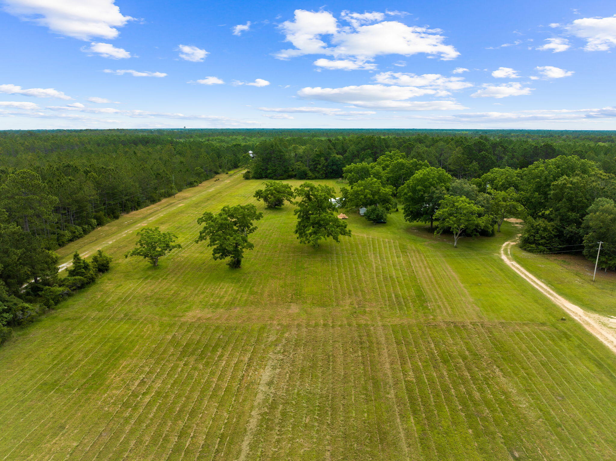 2671 County Highway 83A West Freeport, FL 32439 - Photo 30 of 55 a view of a lake with a big yard