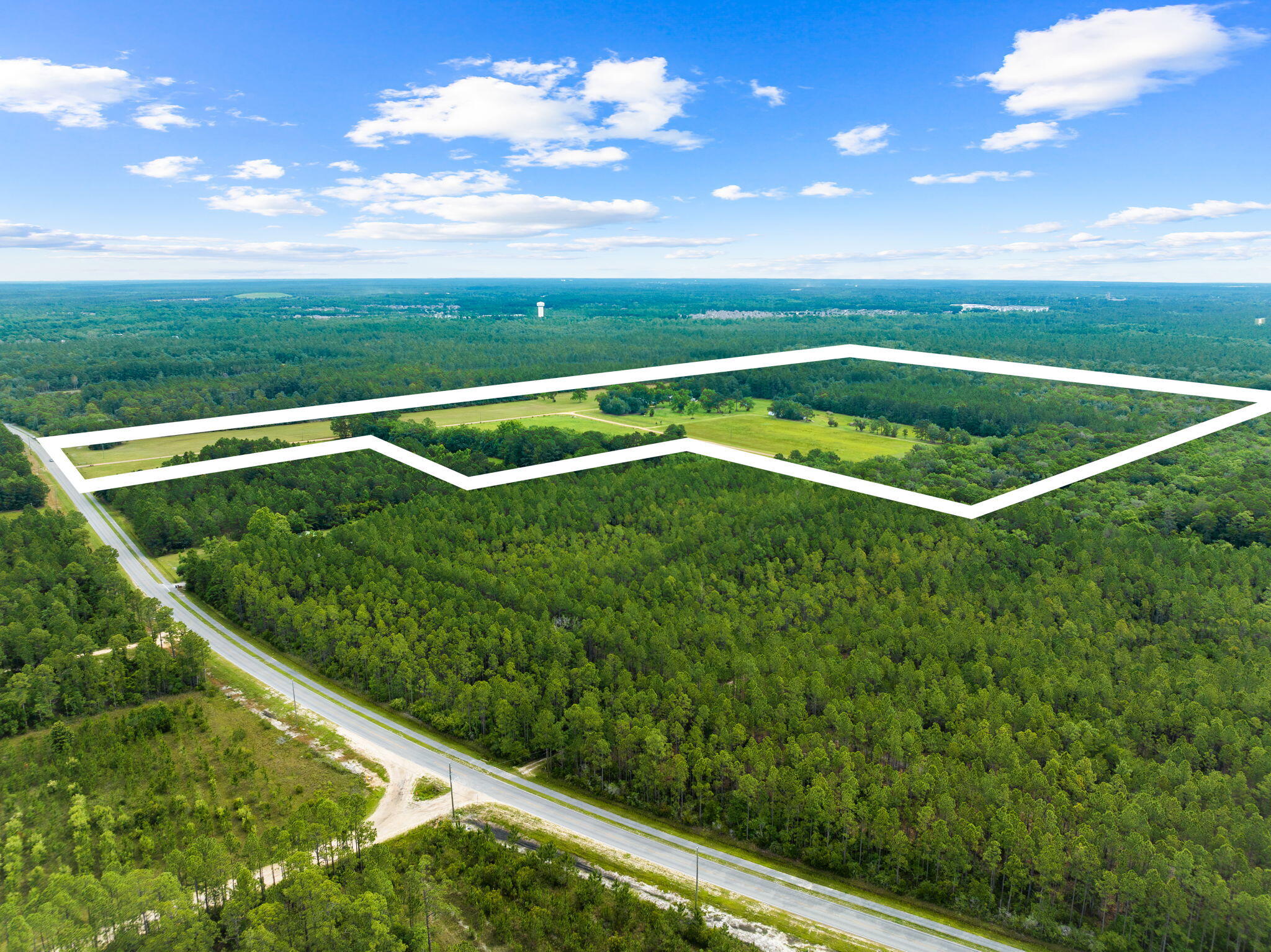 2671 County Highway 83A West Freeport, FL 32439 - Photo 10 of 55 a view of a pool in the middle of a garden