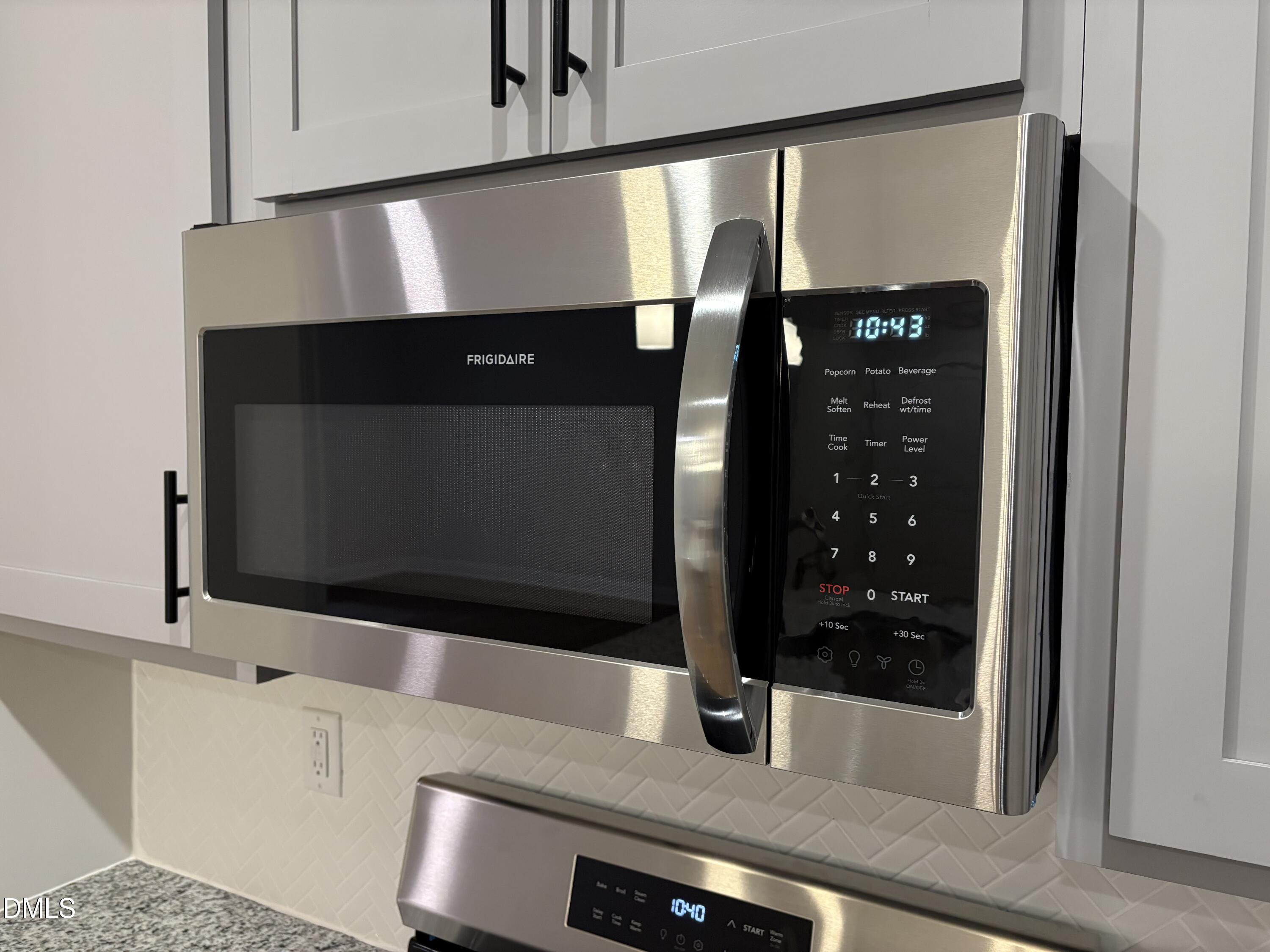 607 Weather Ridge Lane, Unit 24 Cary, NC 27513 - Photo 11 of 26 a bathroom with a sink and a mirror