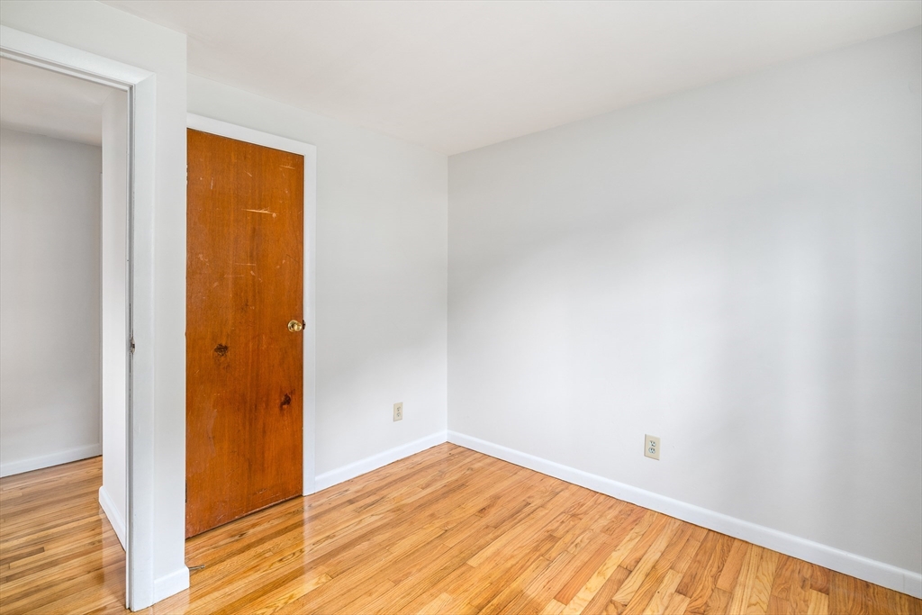 84 Sandy Hill Road Northampton, MA 01062 - Photo 23 of 33 a view of empty room with wooden floor