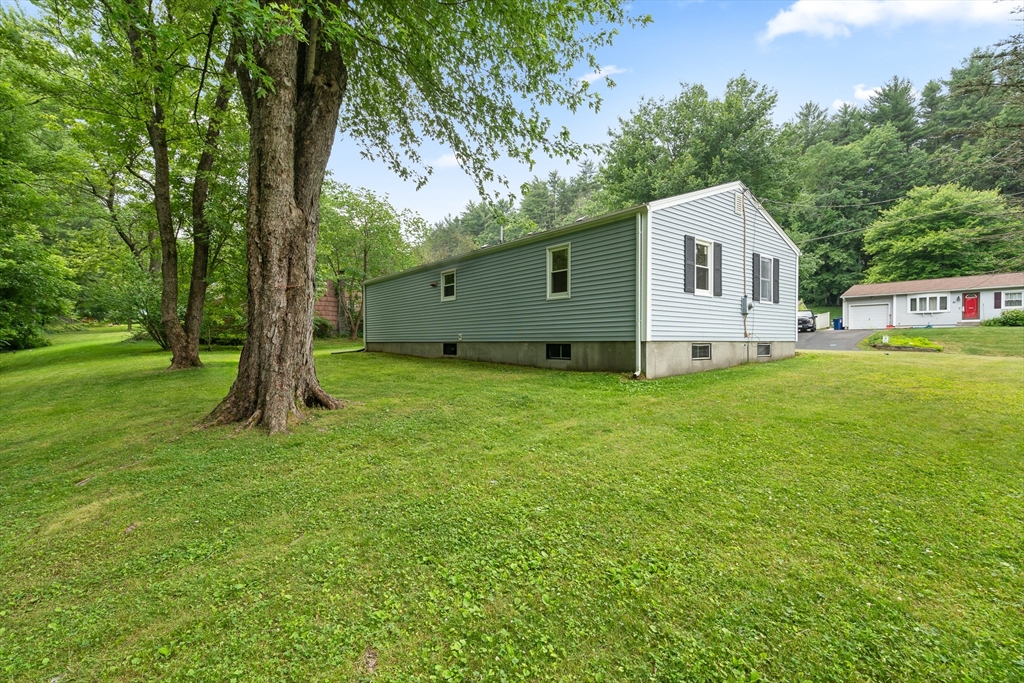 84 Sandy Hill Road Northampton, MA 01062 - Photo 29 of 33 a view of a house with a yard