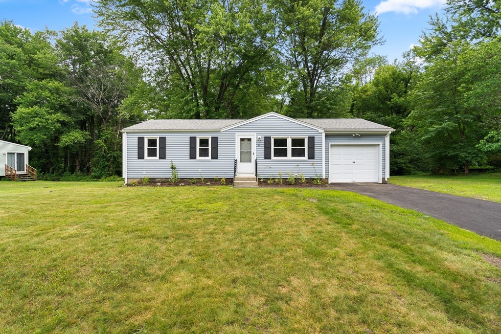 84 Sandy Hill Road Northampton, MA 01062 - Photo 4 of 33 a house view with a garden space