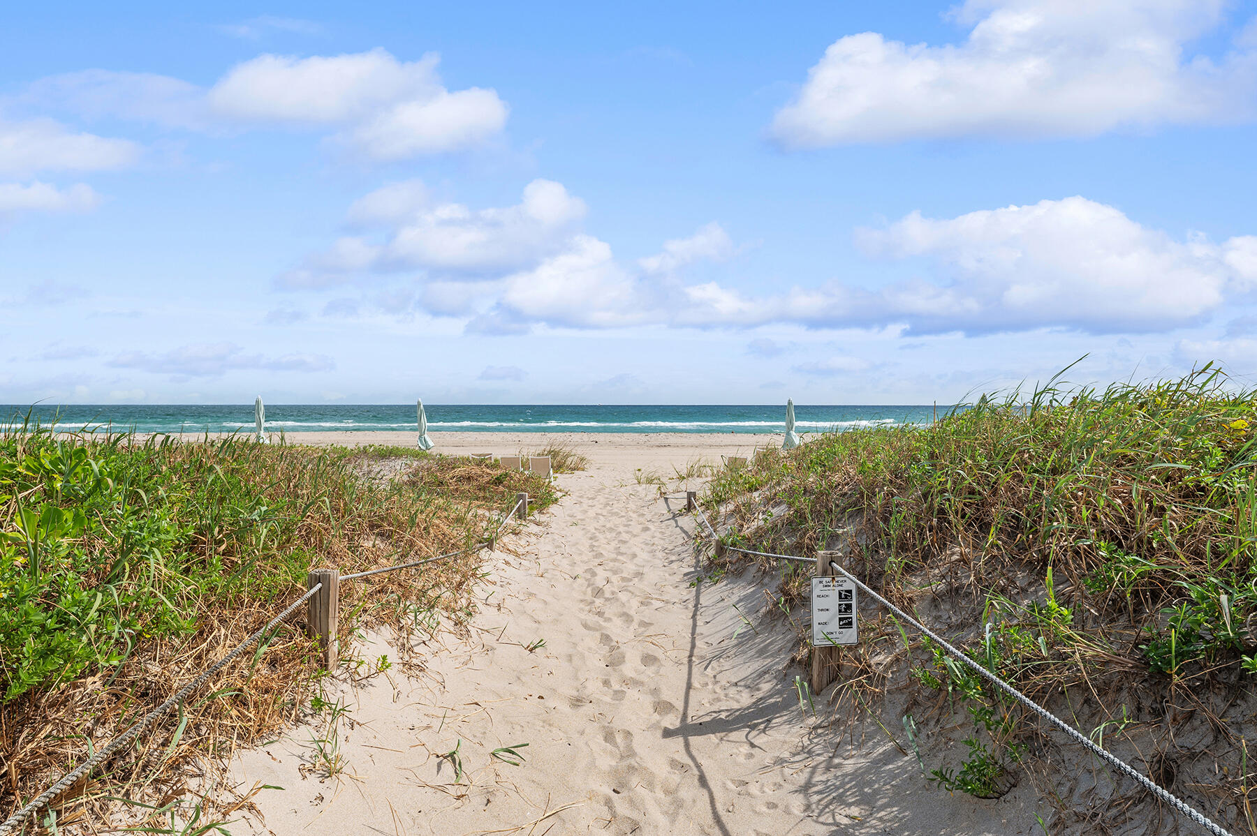 2565 South Ocean Boulevard, Unit 1180 Palm Beach, FL 33480 - Photo 11 of 11 a view of a lake with a yard