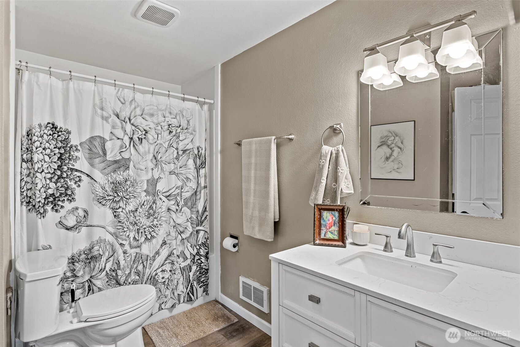 708 Cherry Court Wenatchee, WA 98801 - Photo 13 of 26 a bathroom with a sink a toilet and a mirror