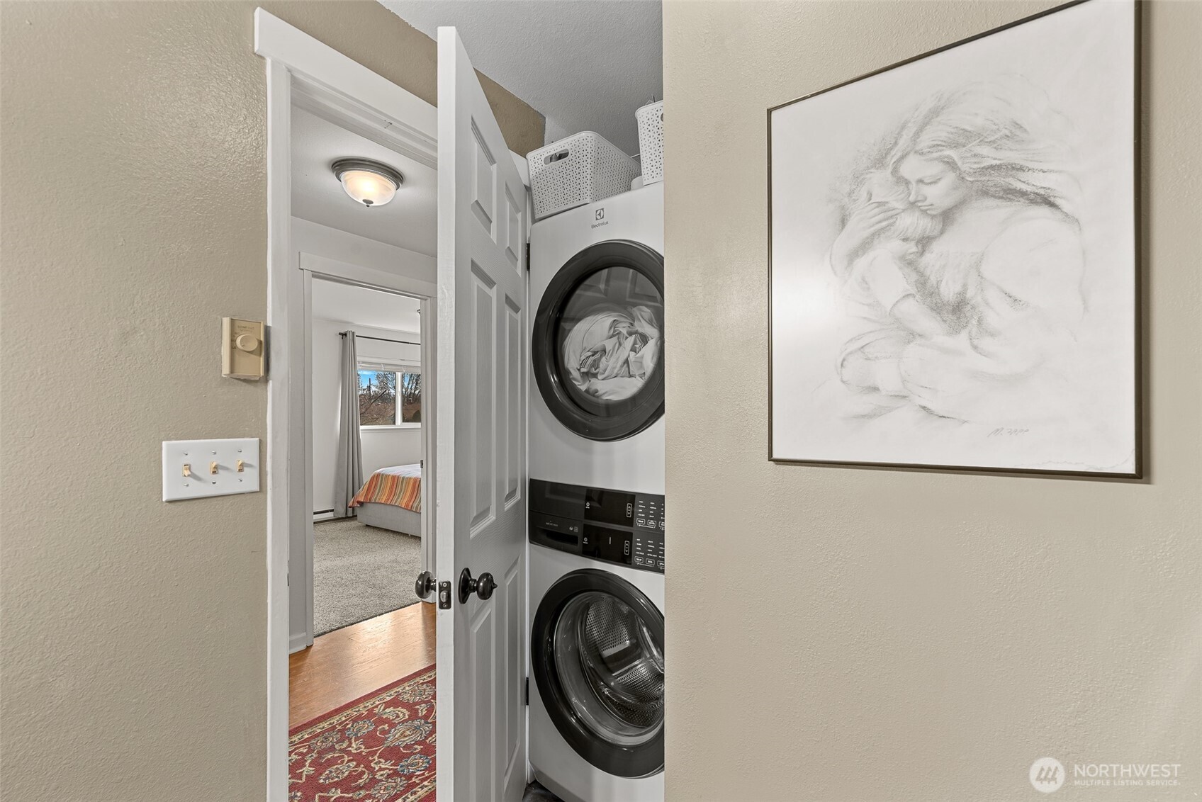 708 Cherry Court Wenatchee, WA 98801 - Photo 15 of 26 a close view of a utility room with dryer and washer