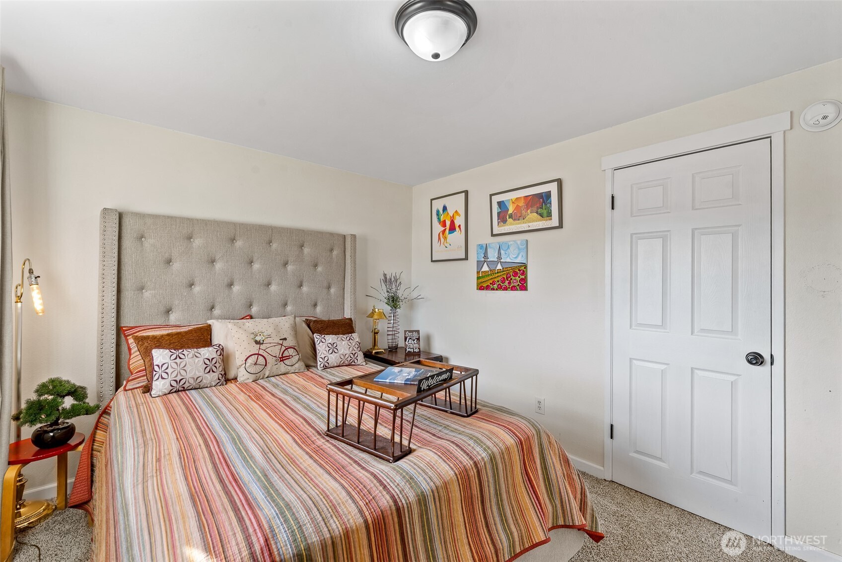 708 Cherry Court Wenatchee, WA 98801 - Photo 18 of 26 a bedroom with a bed and wooden floor