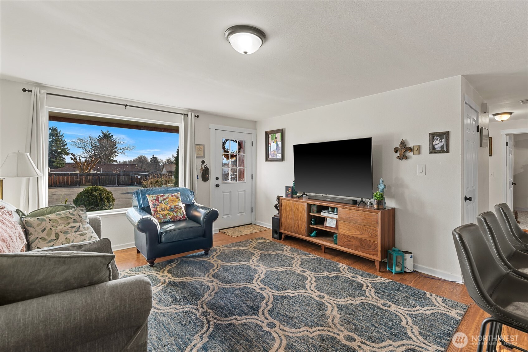 708 Cherry Court Wenatchee, WA 98801 - Photo 3 of 26 a living room with furniture and a flat screen tv