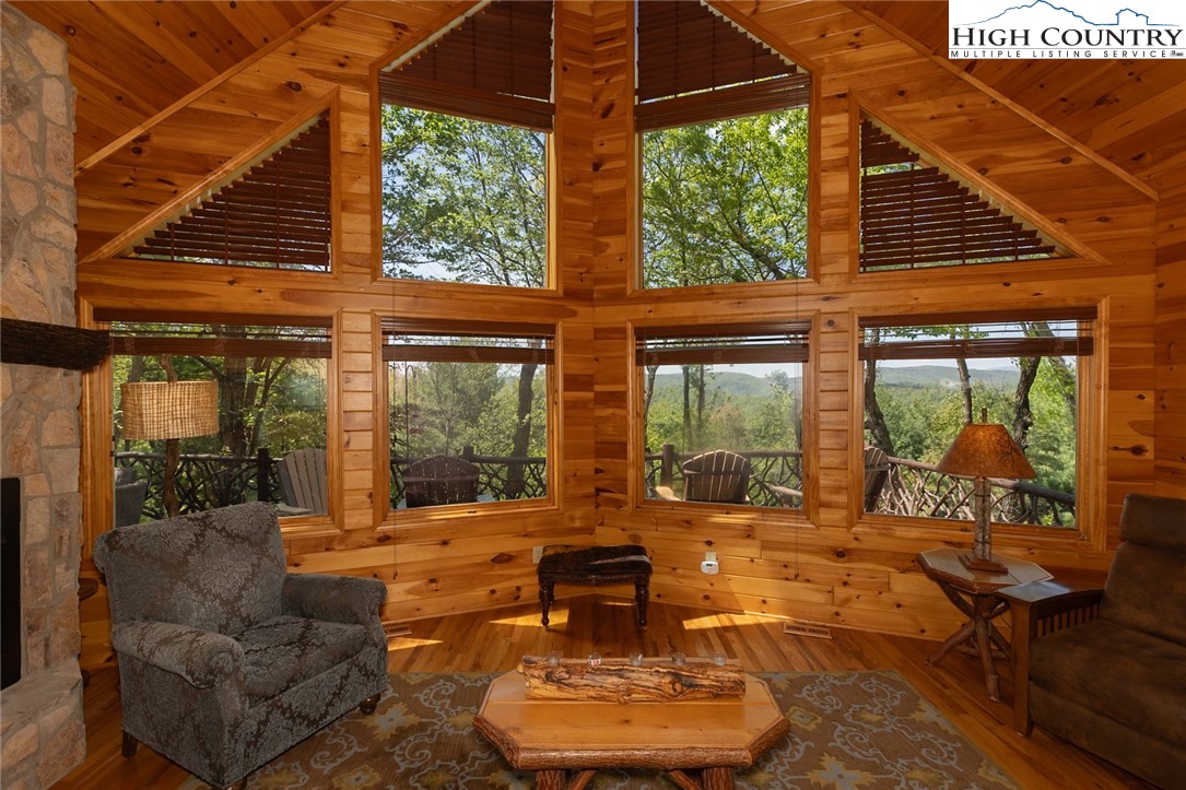 142 Fawn Lane Purlear, NC 28665 - Photo 11 of 49 a building outdoor space with patio furniture and potted plants