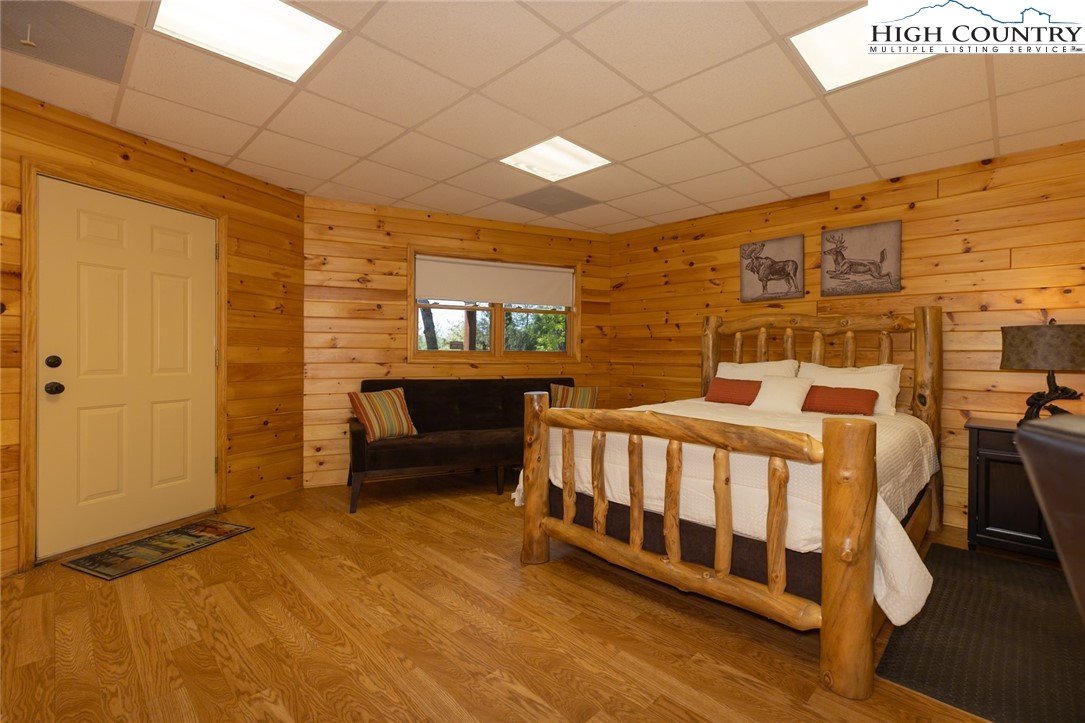 142 Fawn Lane Purlear, NC 28665 - Photo 29 of 49 a bedroom with furniture and a window