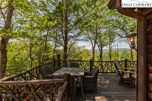 a view of outdoor space with table and chairs