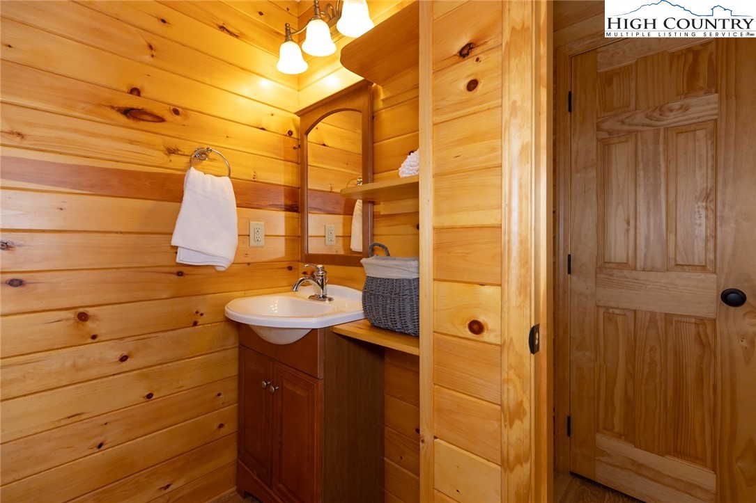 142 Fawn Lane Purlear, NC 28665 - Photo 34 of 49 a bathroom with a sink and mirror
