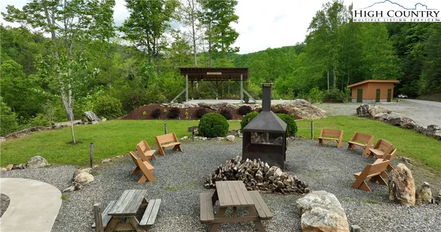 a view of a garden with a lake