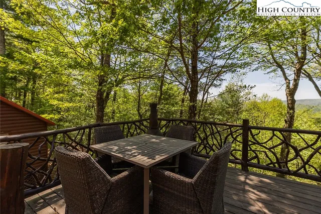 a view of a balcony with furniture