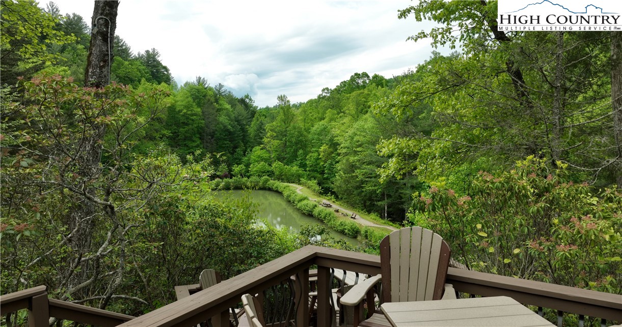 142 Fawn Lane Purlear, NC 28665 - Photo 42 of 49 a view of a balcony with wooden fence and floor