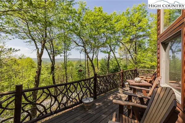 a view of a balcony with mountain view