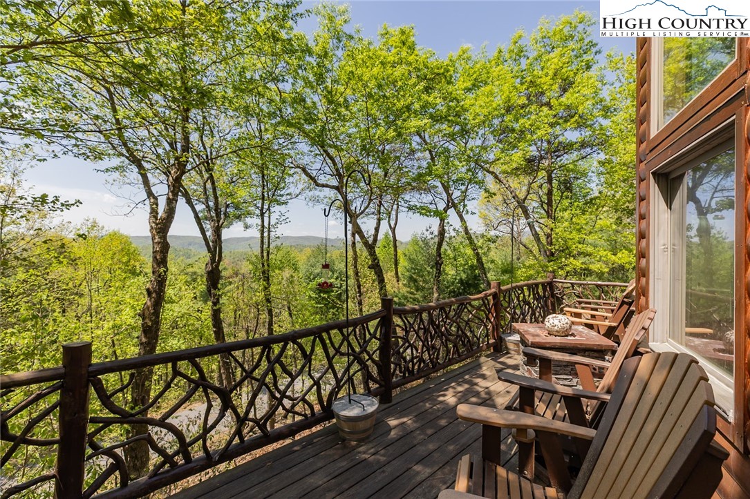 142 Fawn Lane Purlear, NC 28665 - Photo 5 of 49 a view of a balcony with mountain view