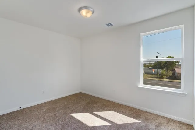 an empty room with a window