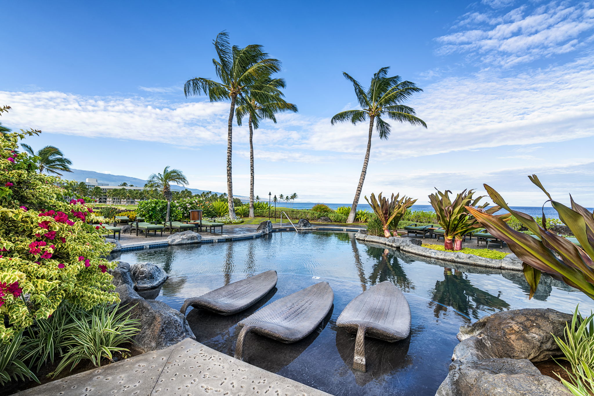 69-1033 Nawahine Place, Unit 22G Waikoloa, HI 96738 - Photo 21 of 30 a view of a lake with outdoor seating space