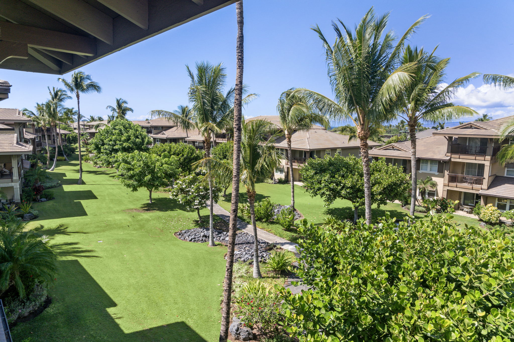 69-1033 Nawahine Place, Unit 22G Waikoloa, HI 96738 - Photo 24 of 30 a view of a yard with plants