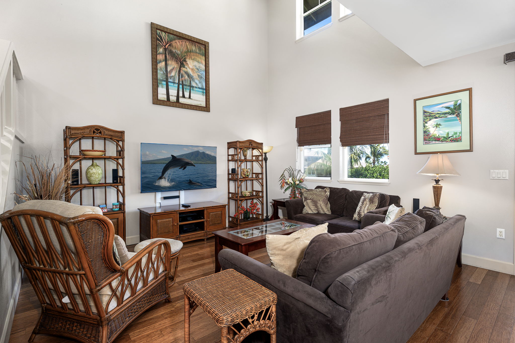 69-1033 Nawahine Place, Unit 22G Waikoloa, HI 96738 - Photo 10 of 30 a living room with furniture a flat screen tv and a window