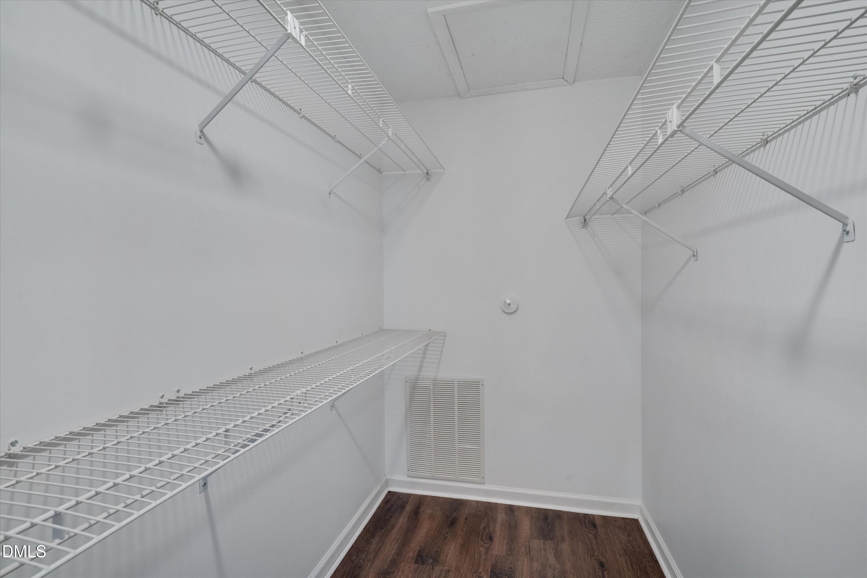 120 Sparger Springs Lane Durham, NC 27705 - Photo 19 of 26 a view of a room with racks on the wall