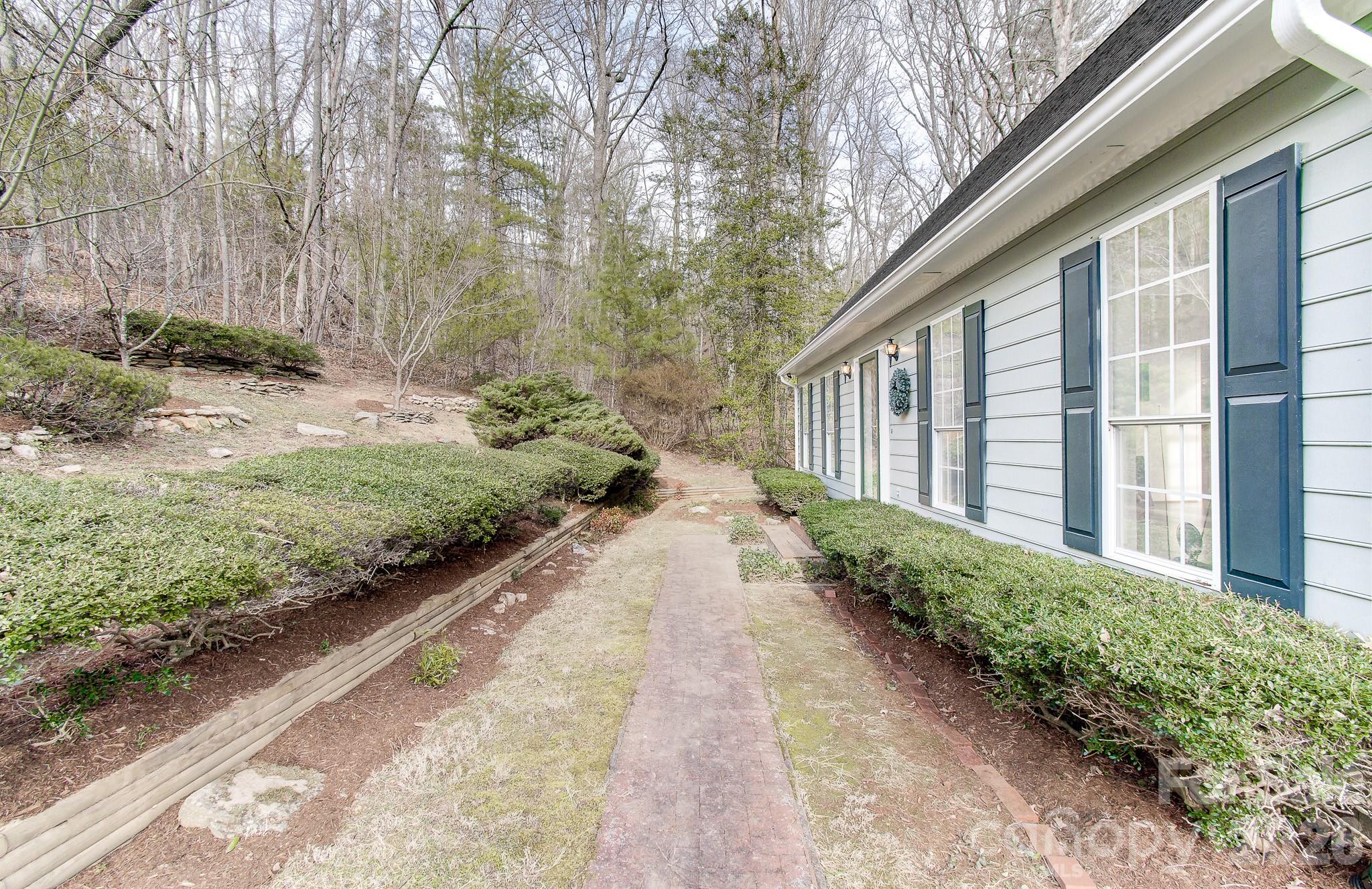 456 Mills Gap Road Arden, NC 28704 - Photo 40 of 43 a view of a pathway with a pathway