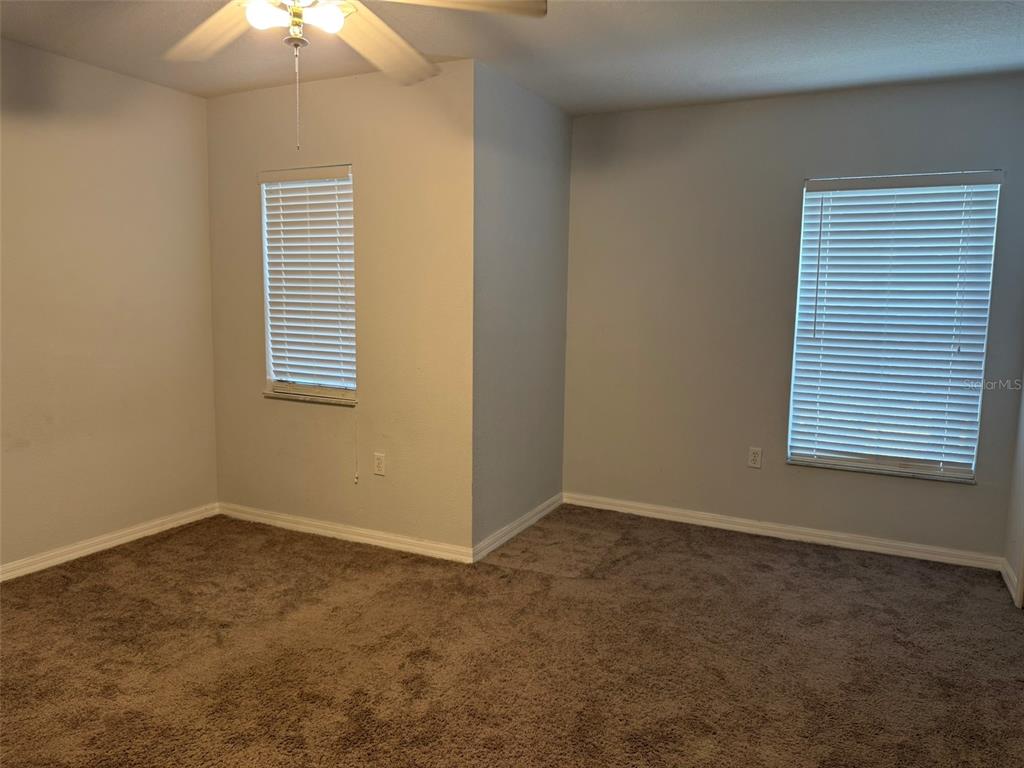 6907 Marble Fawn Place Riverview, FL 33578 - Photo 11 of 11 an empty room with a window