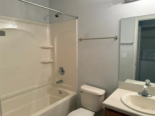 a view of empty room with windows