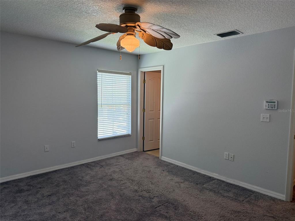 6907 Marble Fawn Place Riverview, FL 33578 - Photo 9 of 11 a view of empty room with windows