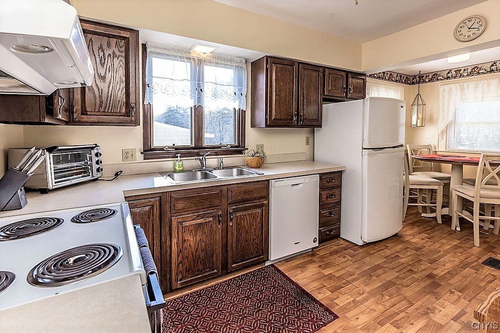 202 Cornwall Drive DeWitt, NY 13214 - Photo 12 of 27 and is just off the eat in kitchen