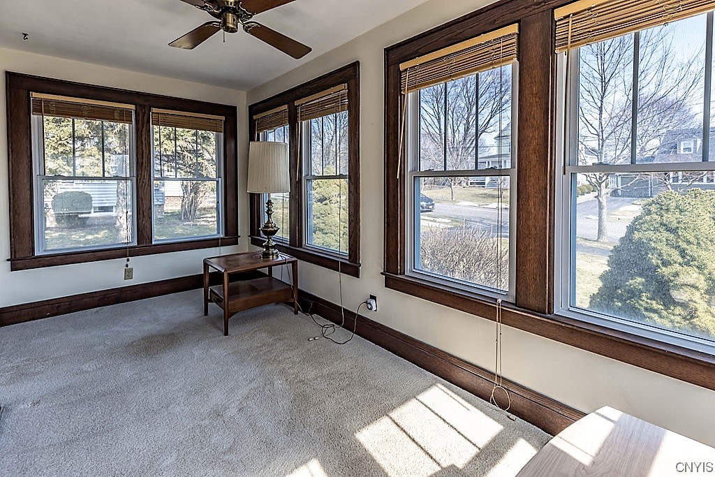 202 Cornwall Drive DeWitt, NY 13214 - Photo 9 of 27 The front room is full of windows that have