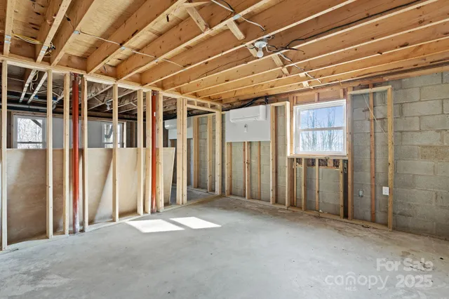 a view of a house with wooden deck