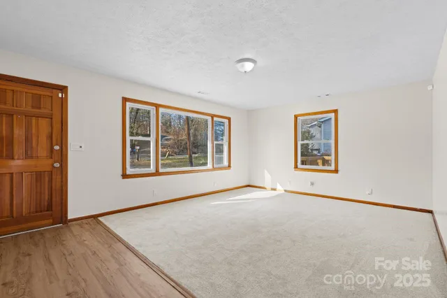 an empty room with windows