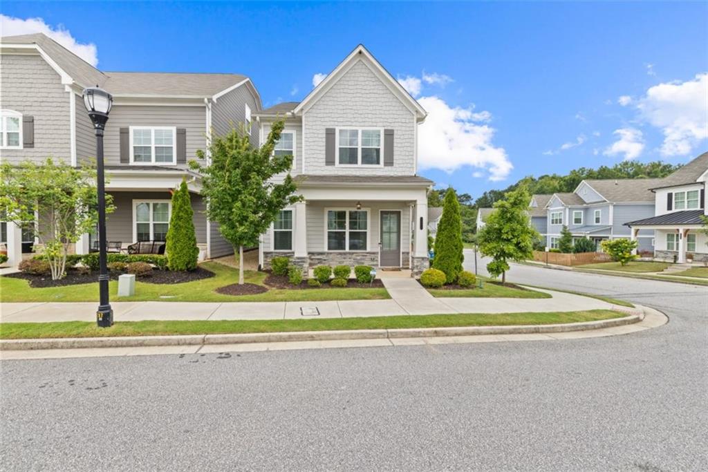 1993 Granite Hls Road Atlanta, GA 30318 - Photo 1 of 1 a front view of a house with a yard
