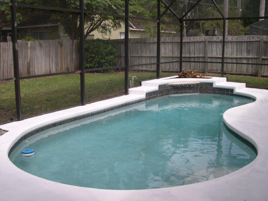 1437 East Amanda Road Kissimmee, FL 34744 - Photo 12 of 12 a view of a swimming pool with a yard