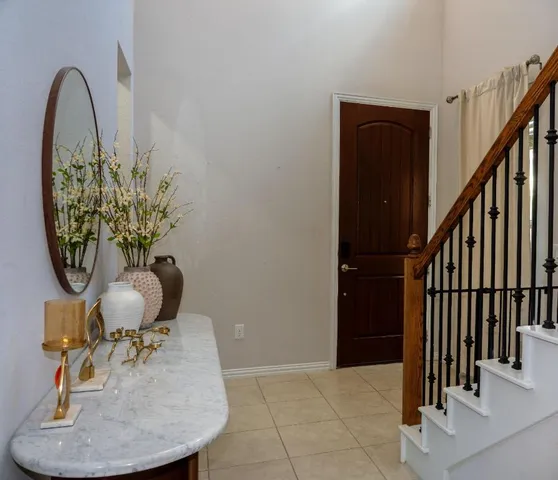 a vase of flowers sitting on a table