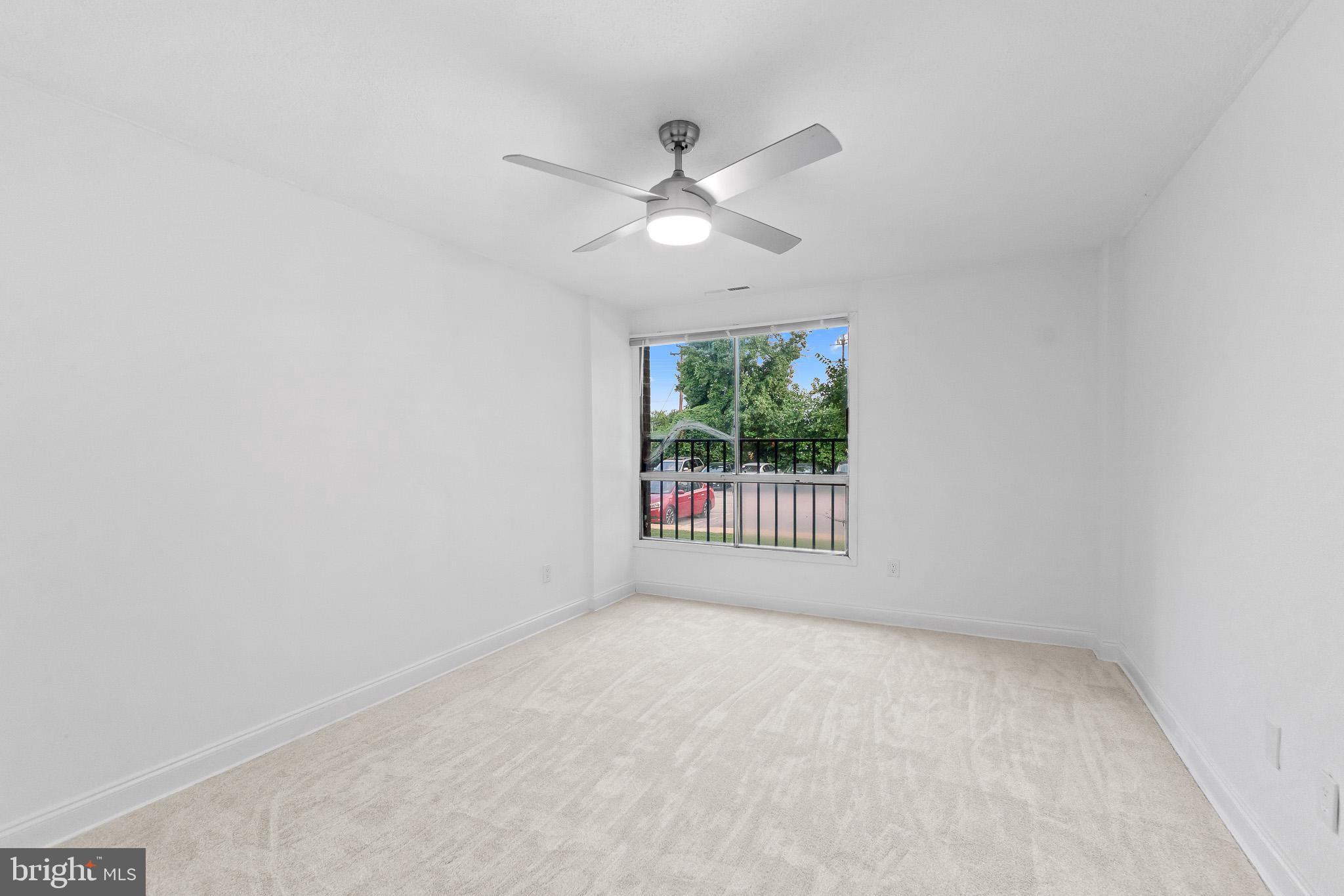 7975 Riggs Road, Unit 4 Hyattsville, MD 20783 - Photo 15 of 22 a view of an empty room with a window
