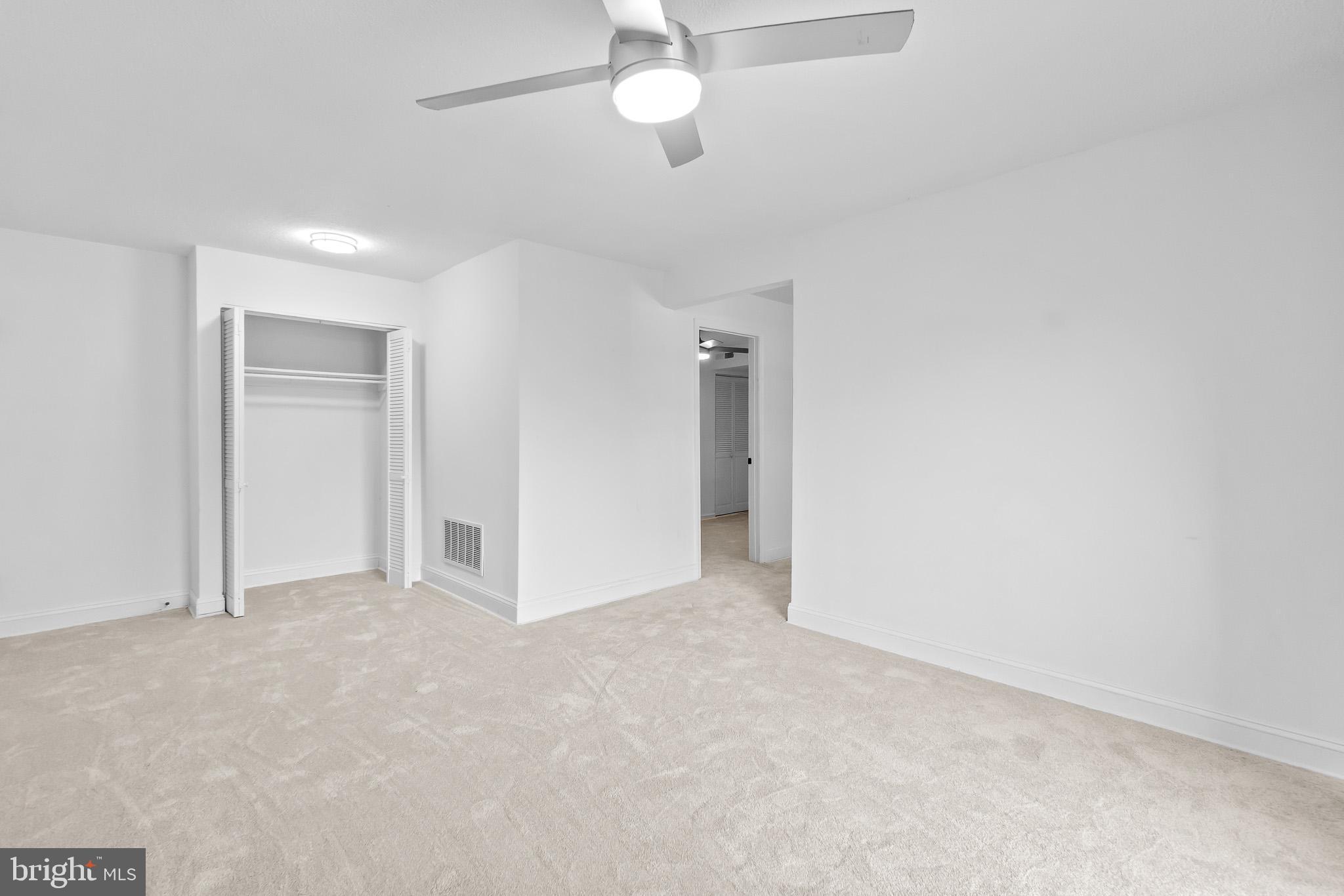 7975 Riggs Road, Unit 4 Hyattsville, MD 20783 - Photo 6 of 22 wooden floor in an empty room