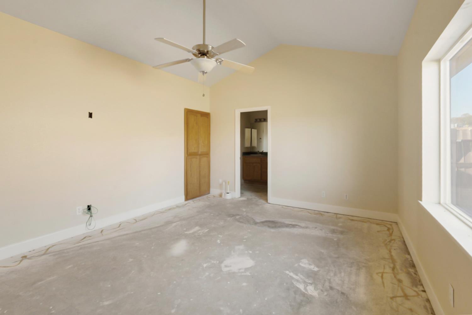 3493 Quail Hill Road Copperopolis, CA 95228 - Photo 22 of 38 a view of an empty room with a window