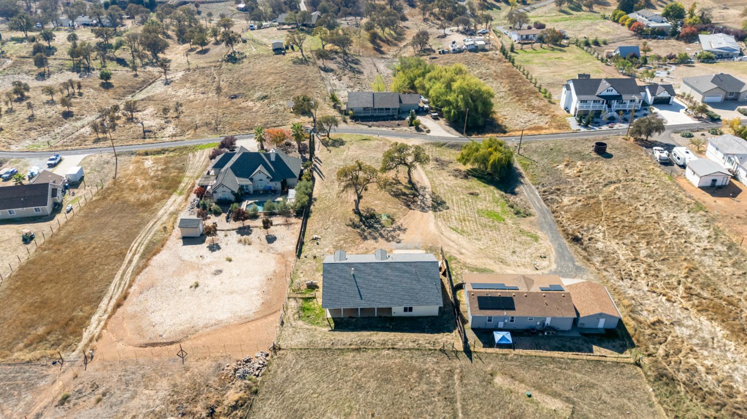 3493 Quail Hill Road Copperopolis, CA 95228 - Photo 5 of 38 an aerial view of residential houses with outdoor space